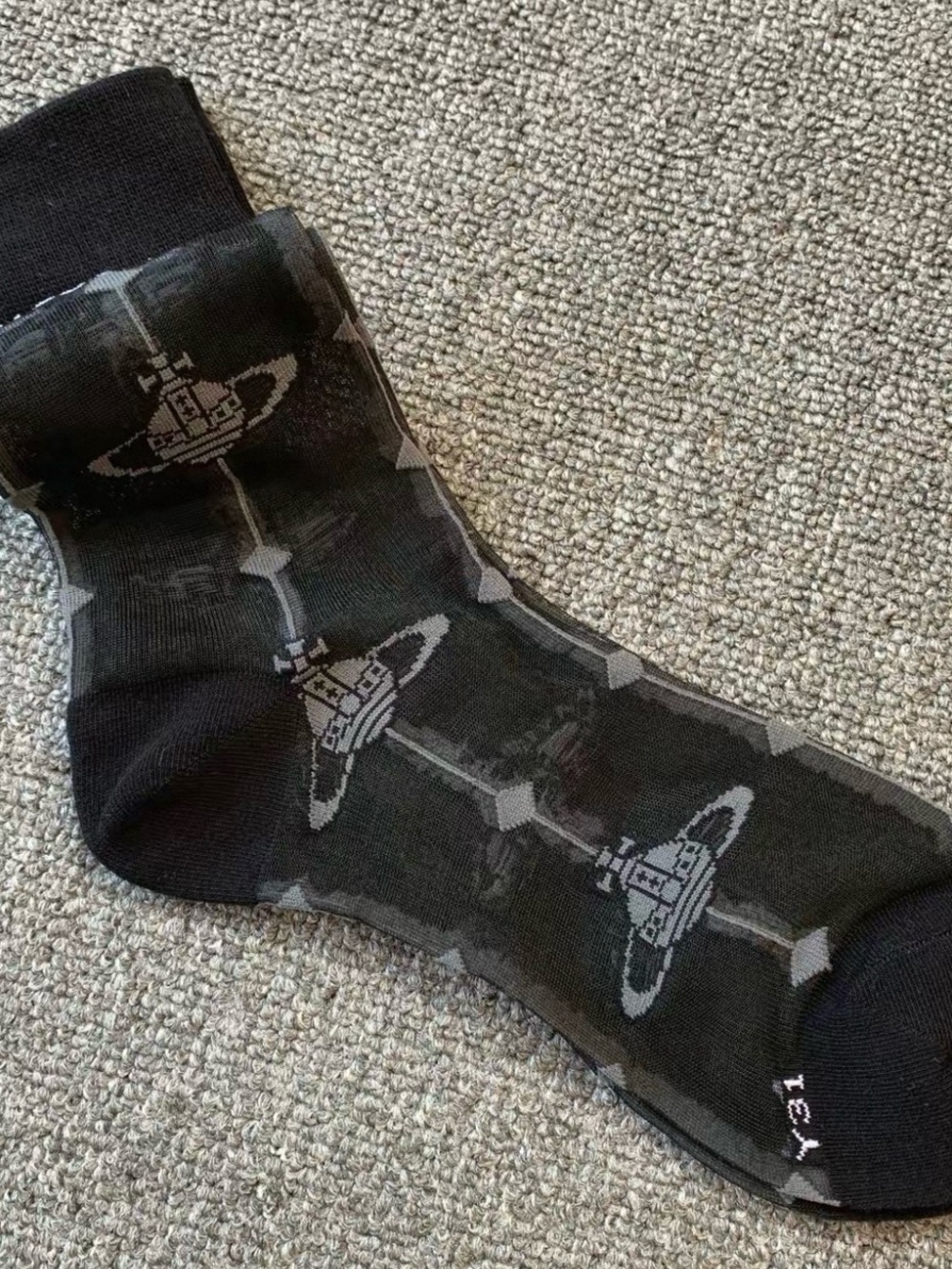 Black Patterned womenCrew Sock with Orbital Motif